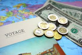 HOW TO AVOID ADDED CURRENCY FEES WHEN TRAVELING ABROAD